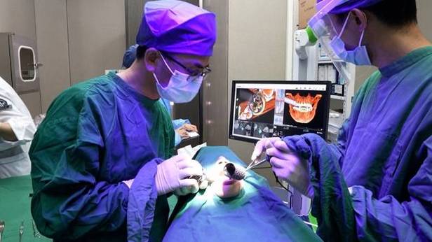 宁波口腔医院植牙效果怎样？价格贵不贵，靠谱吗？-图1